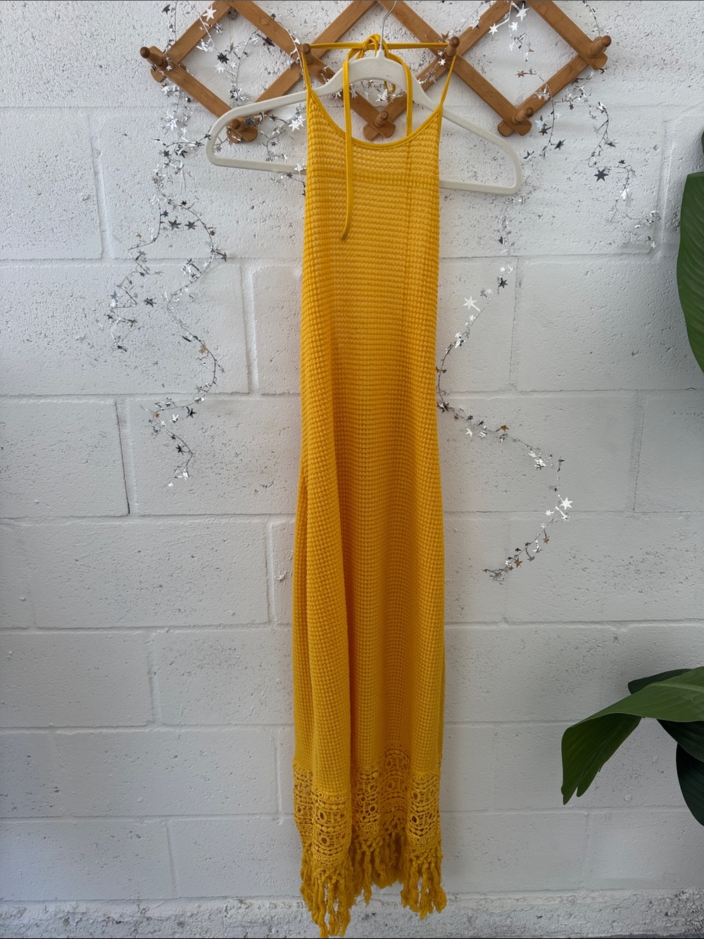 Yellow knit halter maxi dress with crochet detail and fringe
